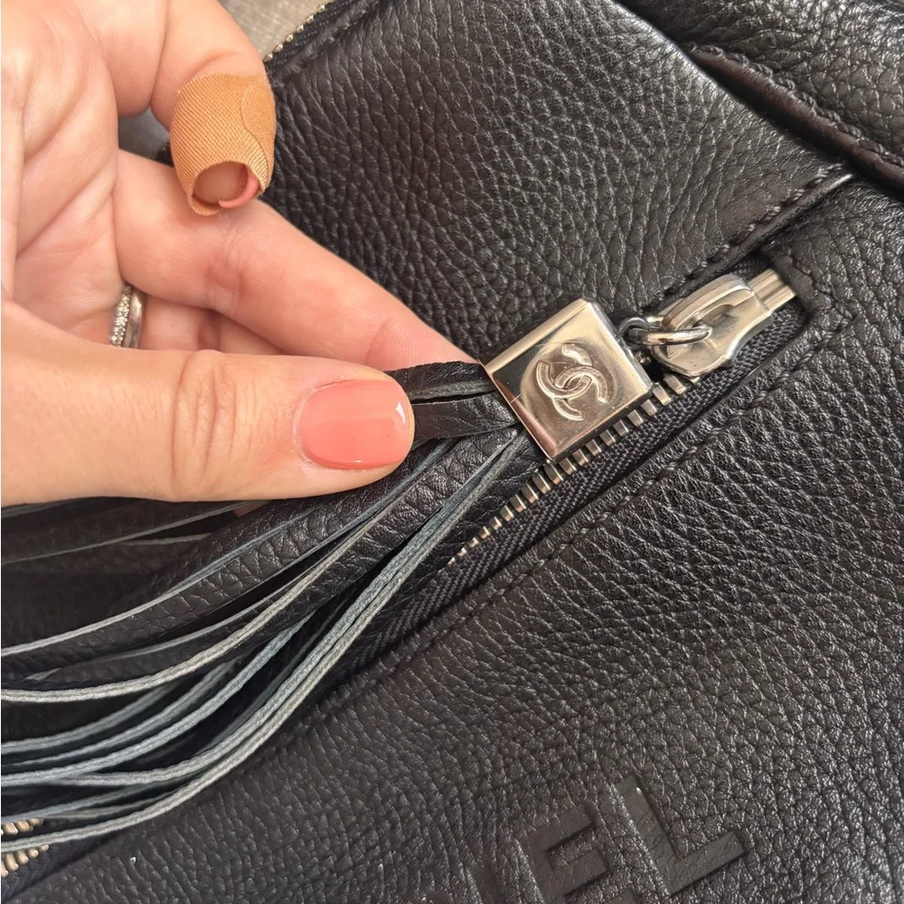 Authentic CHANEL black grained calfskin CC oversized charm baguette hobo bag